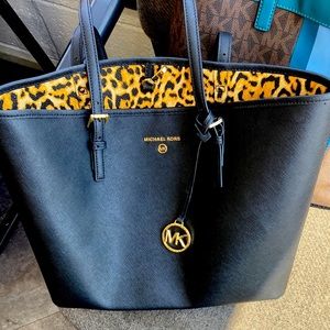 Genuine Michael Kors leather purse, brand new. Zero wear and tear